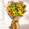 Fresh yellow and orange lily bouquet in jute wrap for same day flower delivery in Bangalore by FreshKnots