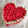 Heart-shaped red rose box with baby’s breath for romantic gifting - FreshKnots same-day flower delivery in Bangalore.