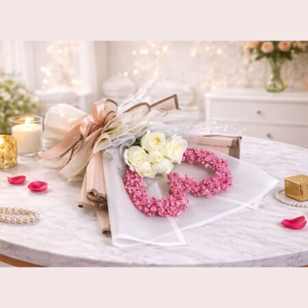 White rose Valentine bouquet with pink heart baby’s breath design and luxury wrapping in Bangalore