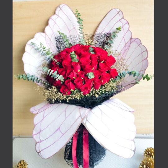 Luxury red rose bouquet with designer wrapping for same day flower delivery in Bangalore by FreshKnots