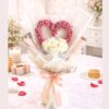 White rose Valentine bouquet with pink heart baby’s breath design and luxury wrapping in Bangalore