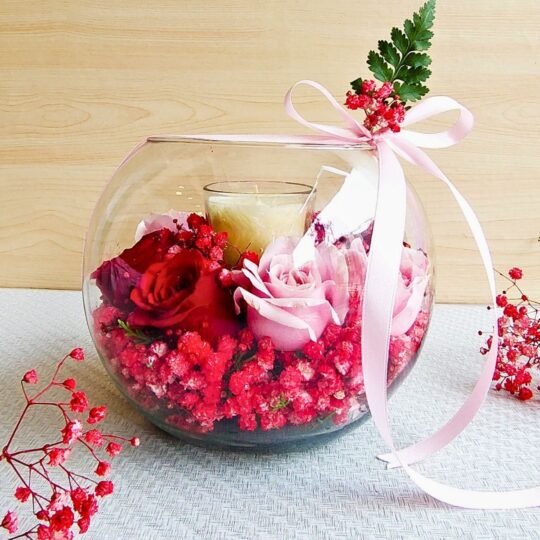 Rose and candle glass bowl arrangement for same day flower delivery in Bangalore by FreshKnots