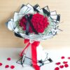 Red rose bouquet with white fillers for Valentine’s Day flower delivery in Bangalore by FreshKnots