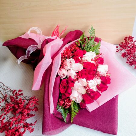 Luxurious red and pink rose bouquet by FreshKnots with same-day flower delivery in Bangalore