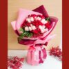 Luxurious red and pink rose bouquet by FreshKnots with same-day flower delivery in Bangalore