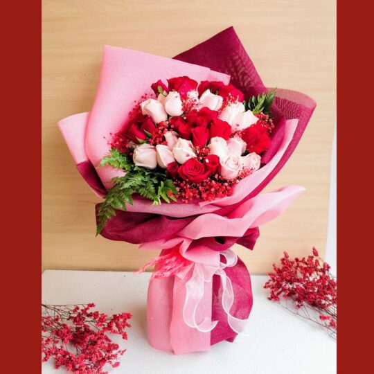 Luxurious red and pink rose bouquet by FreshKnots with same-day flower delivery in Bangalore
