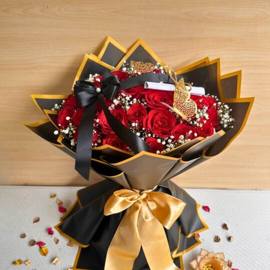 Luxury red rose Valentine bouquet with black and gold wrapping