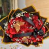 Luxury red rose Valentine bouquet with black and gold wrapping