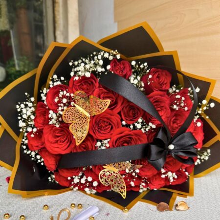 Luxury red rose Valentine bouquet with black and gold wrapping