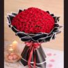 Luxury red rose bouquet with premium black wrapping by FreshKnots, ideal for same day flower delivery and romantic gifting in Bangalore.