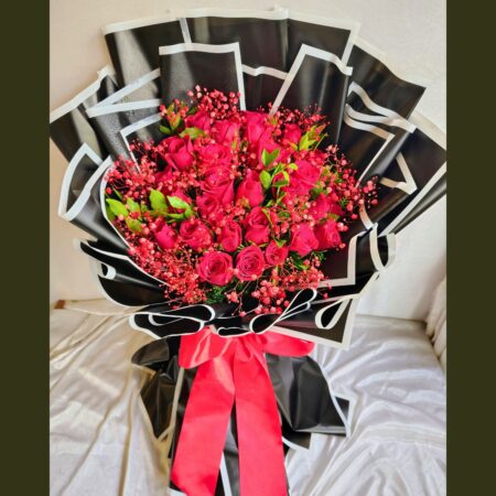 Luxury red rose bouquet for same day flower delivery in Bangalore by FreshKnots, ideal anniversary and proposal flowers