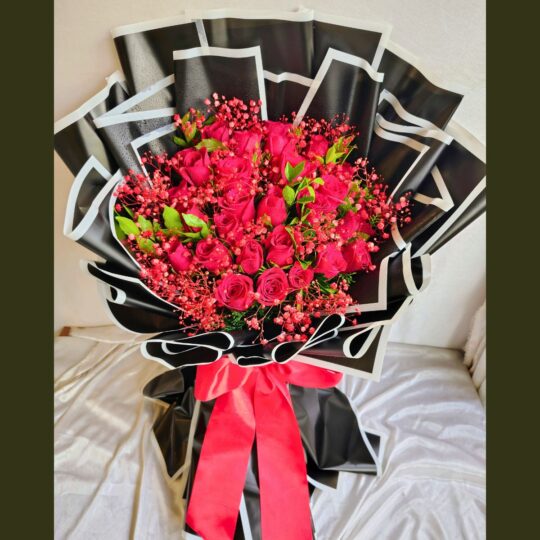Luxury red rose bouquet for same day flower delivery in Bangalore by FreshKnots, ideal anniversary and proposal flowers