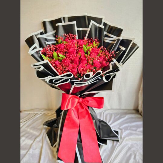 Luxury red rose bouquet for same day flower delivery in Bangalore by FreshKnots, ideal anniversary and proposal flowers