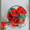 Red rose glass vase flower arrangement by FreshKnots Bangalore