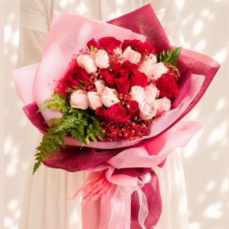 Luxurious red and pink rose bouquet by FreshKnots with same-day flower delivery in Bangalore