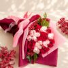 Luxurious red and pink rose bouquet by FreshKnots with same-day flower delivery in Bangalore