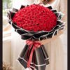 Luxury red rose bouquet with premium black wrapping by FreshKnots, ideal for same day flower delivery and romantic gifting in Bangalore.