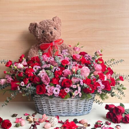 Valentine flower basket with teddy bear by FreshKnots Bangalore, romantic roses and pink flowers gift.