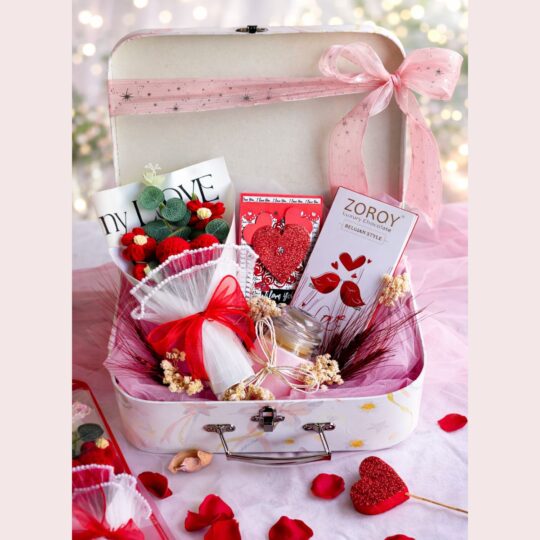 Valentine gift hamper suitcase box with crochet flowers, Belgian chocolate, and greeting card in Bangalore