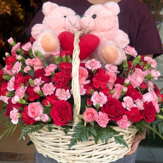 Valentine’s Day flower basket with red and pink roses, carnations and teddy bears by FreshKnots Bangalore