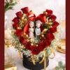 Premium red rose heart arrangement with couple figurines by Bangalore florist