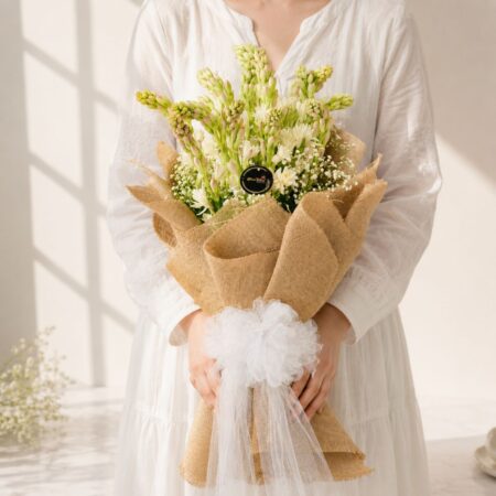 Rajnigandha bouquet Bangalore with white tuberose and daisies for same day flower delivery