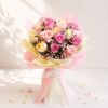 Fresh pastel rose bouquet wrapped in pink and cream paper for same day flower delivery in Bangalore by FreshKnots