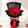Black and red rose bouquet with lace detailing, FreshKnots luxury flowers, premium bouquet for gifting in Bangalore.