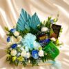 Luxury cake and flower hamper with fresh flowers and gourmet treats for premium gifting in Bangalore.
