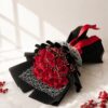 Black and red rose bouquet with lace detailing, FreshKnots luxury flowers, premium bouquet for gifting in Bangalore.