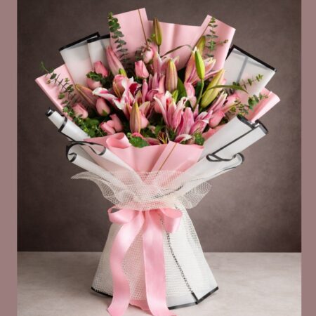 Luxury pink lily and rose hand-tied bouquet with pastel wrapping and satin ribbon, premium fresh flower arrangement for birthday and anniversary gift.