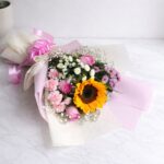 Premium sunflower and pink rose bouquet with baby’s breath in pastel wrapping, fresh flower delivery Bangalore