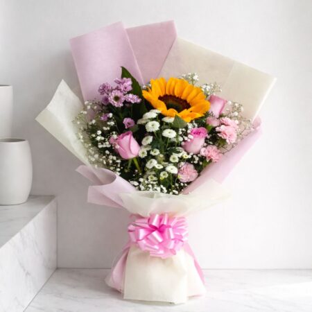 Premium sunflower and pink rose bouquet with baby’s breath in pastel wrapping, fresh flower delivery Bangalore