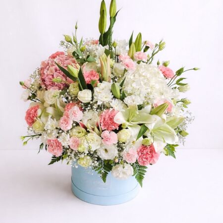 Pastel flower box with white lilies, roses, hydrangeas and pink carnations in premium hat box Bangalore flower delivery