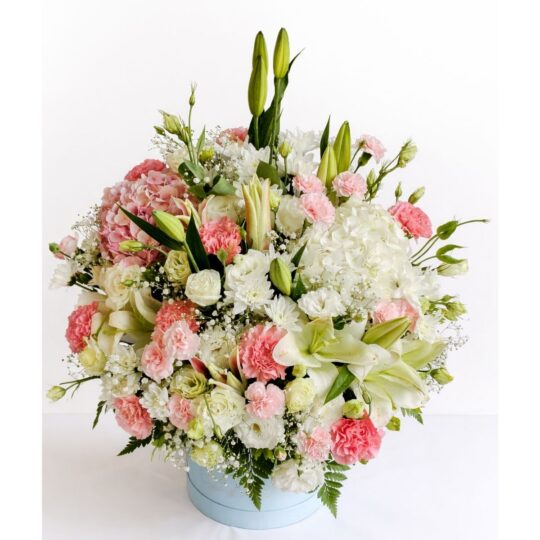 Pastel flower box with white lilies, roses, hydrangeas and pink carnations in premium hat box Bangalore flower delivery