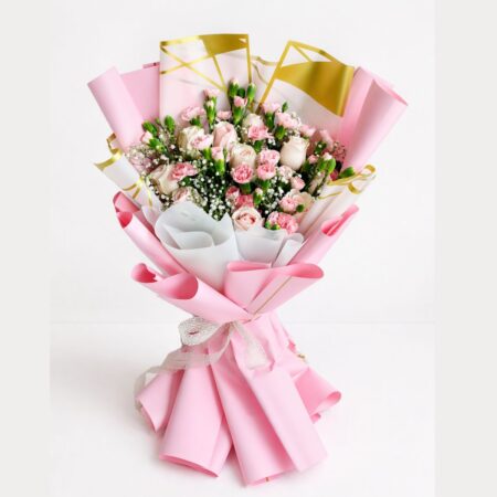 Pink rose and carnation bouquet with baby’s breath in pastel wrapping Bangalore same day flower delivery