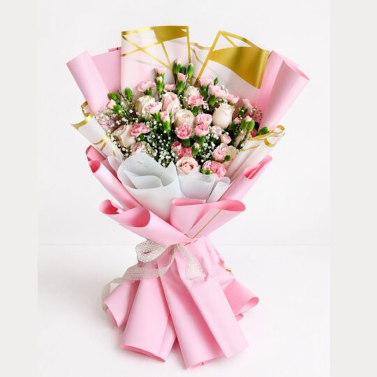 Pink rose and carnation bouquet with baby’s breath in pastel wrapping Bangalore same day flower delivery