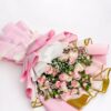 Pink rose and carnation bouquet with baby’s breath in pastel wrapping Bangalore same day flower delivery