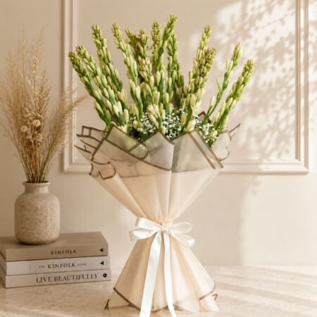 Luxury white Rajnigandha bouquet with premium wrapping for elegant flower delivery in Bangalore.