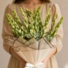 Luxury white Rajnigandha bouquet with premium wrapping for elegant flower delivery in Bangalore.
