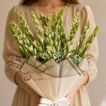Luxury white Rajnigandha bouquet with premium wrapping for elegant flower delivery in Bangalore.