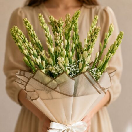 Luxury white Rajnigandha bouquet with premium wrapping for elegant flower delivery in Bangalore.
