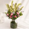 Tuberose vase arrangement Bangalore with pink eustoma and fresh seasonal blooms for same day flower delivery