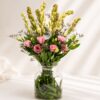 Tuberose vase arrangement Bangalore with pink eustoma and fresh seasonal blooms for same day flower delivery