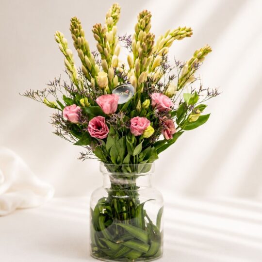 Tuberose vase arrangement Bangalore with pink eustoma and fresh seasonal blooms for same day flower delivery