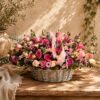 Premium pink and peach floral basket arrangement for online flower delivery in Bangalore.