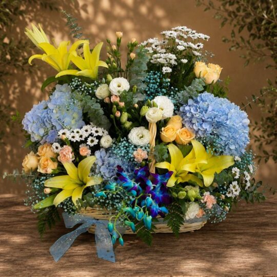 Premium blue hydrangea and orchid floral basket arrangement for online flower delivery in Bangalore.