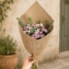 Pastel daisy chrysanthemum bouquet with eucalyptus and rustic jute wrapping for online flower delivery in Bangalore.