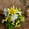 Premium European style bouquet with yellow lilies, white hydrangeas and seasonal flowers by FreshKnots Bangalore.