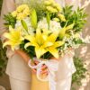 Premium European style bouquet with yellow lilies, white hydrangeas and seasonal flowers by FreshKnots Bangalore.